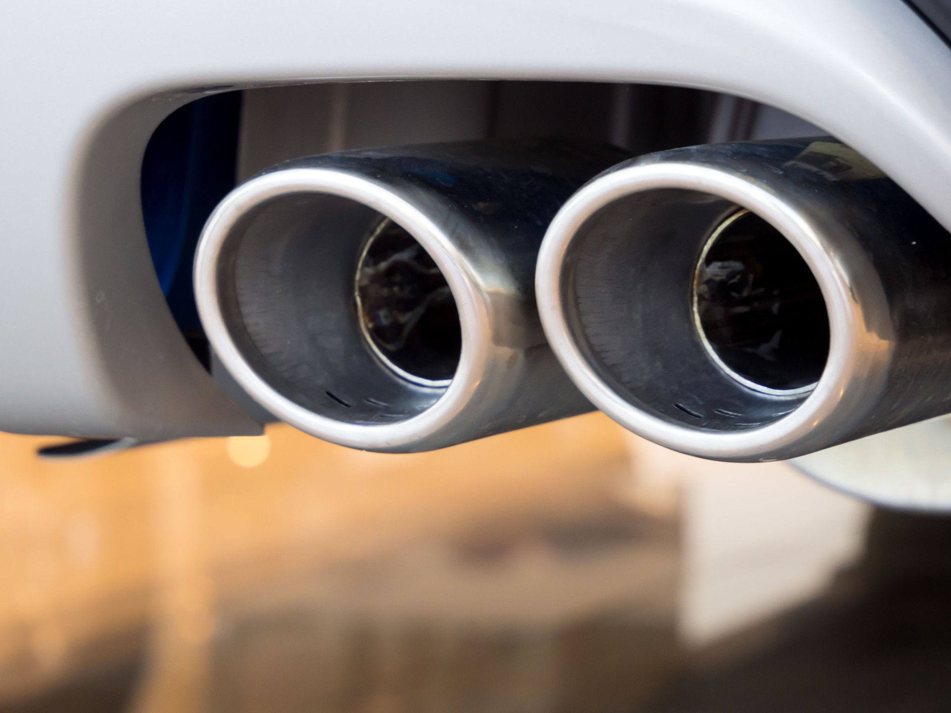 Double exhaust design solution in a conventional car